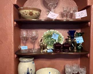 beautiful blue stoneware, Riedel San Michele crystal wine glasses, and red and green glass pieces