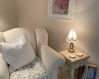 another view of the Crate and Barrel armchair, side table and framed artwork