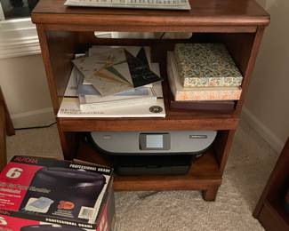 Solid wood printer stand with pull out shelves, printer, Bose sound system, paper shredder, and large button phone and clock