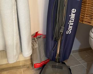 Sanitaire upright vacuum - with bags - like New