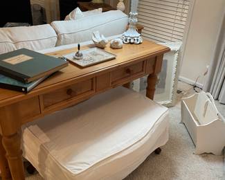 Pine console table with 2 drawers, table lampe, decor, magazine/book holder, and Ethan Allen ottoman