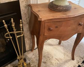Pine side table, fireplace irons and pottery