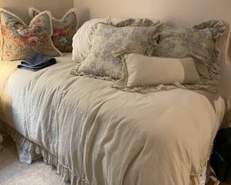 Twin bed, shown with Linen duvet cover over down comforter, linen shams and floral twill and denim pillows