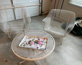 MCM low-profile patio chairs and round cocktail table