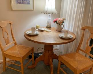 Pine single pedestal table (40" round), rush-seated side chairs, and 60" round cotton and wool rope rug (several more rope rugs available - cotton)