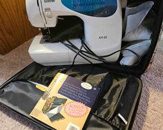 $90 Brother XR 65 Sewing machine and rolling case