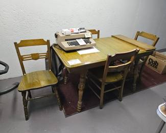 $125 Cute table & 4 chairs, 2 small leaves, has "greenish" hue 
