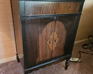 $50, Empty record cabinet 
