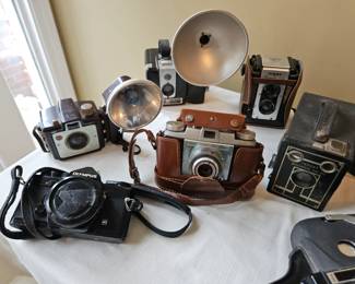 Vintage Cameras.  Kodak Holiday Flash $8, Kodak Brownie with flash $14, Argus $10, Kodak Pony $15, target brownie $8