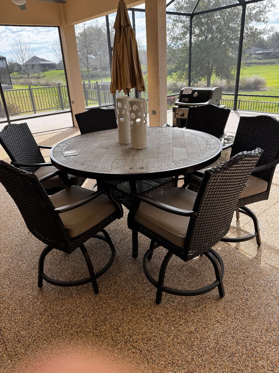 Slate top table 6 swivel chairs