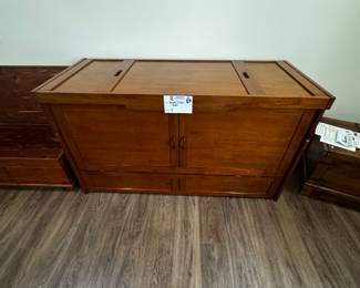 Hideaway bed in a cabinet