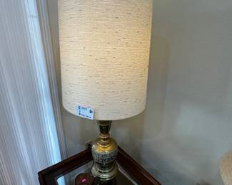 brass lamp and glass top end table