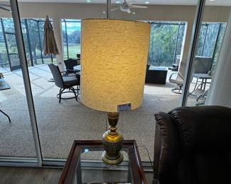brass lamp and glass top end table