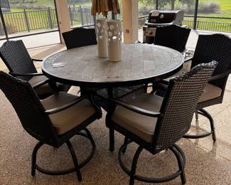Slate top table 6 swivel chairs