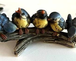 Bluebirds on a log