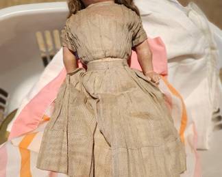 early 1900's doll, original clothes, socks and shoes,