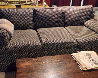 couch, heads up, it's in the basement