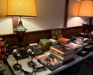 various decor items, books and vintage lamps. 
