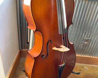 Cello Full Size Apprentice made by Vhou Barley played does have a broken string. STORED IN CASE:&nbsp;Paid $2500
Selling it for $1500 with Case and Stand and bow.&nbsp;OBO.