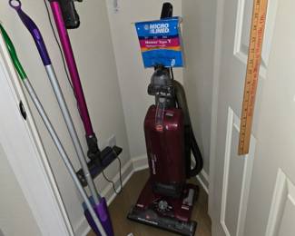 Dyson stick vacuum, Hoover Wind Tunnel, Swiffer wet and dry sweepers