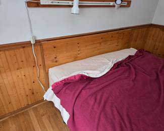 Knotty pine headboard bed