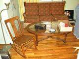 Oak rocker, coffee table, rustic couch
