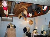 I told you more hats! These are hanging from the rafters!
