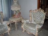 One of a pair of chairs, Italian lamp and table