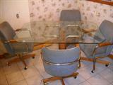 Glass top table with chairs
