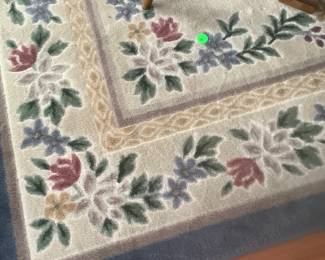 Wool rug in dining room.
