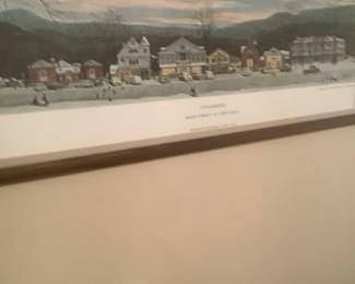Hanging above bed.