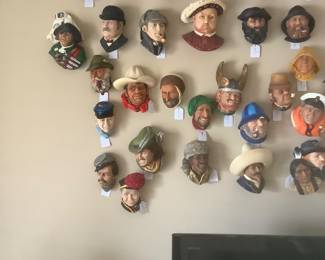 Wall full of collectible heads.