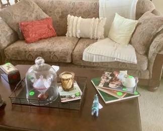 Full view of the beautiful Lazy Boy couch with decorative pillows and throw.