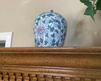 One of the two ginger jars on China cabinet.