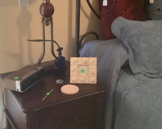 This is one of the end tables that go with bed.  They have a piece of metal on them.