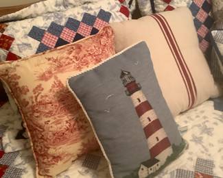 Throw pillows on bed"