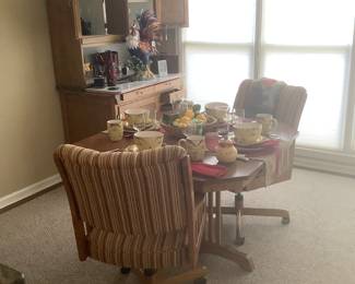 Breakfast table  with the two upholestered chairs in beautiful fabric.