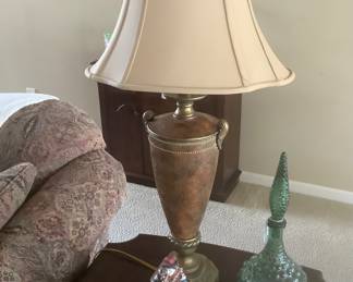 Just one of the beautiful lamps on the end table by couch.  They look like leather.