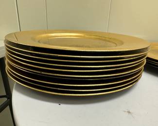 (14pc) Gibson Gold Charger Plates | 10 Gibson gold chargers. 4 Unmarked gold chargers (Made in China) smaller: dia. 13 in. larger: dia. 14 in.
