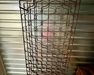 Wine Rack | Large antique wall mount, wrought iron wine rack that holds over 100 bottles in double-sided openings. - h. 7 ft
