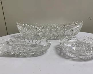 (3pc) Crystal Dishes | Long: h. 2.5 in. x w. 12 in.
Middle: h. 2 in. x w. 7 in. Round: h. 1 in. x w. 5 in.