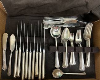 Silverplate Flatware | Silverplate flatware service including: 9 Knives
8 Soup Spoons
15 Spoons
8 Cocktail Forks
8 Salad Forks
7 Dinner Forks
8 Butter Knives
4 Serving Pieces
