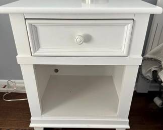 White Bedside Table | Young America white wood nightstand with a single drawer over an open shelf.
