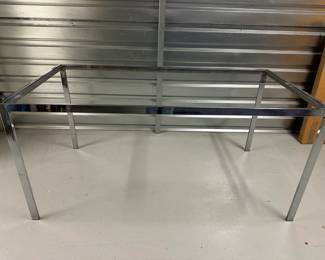 Glass & Chrome Dining Table | Glass dining table with chrome frame. - h. 28 x w. 60 x d. 31 in


