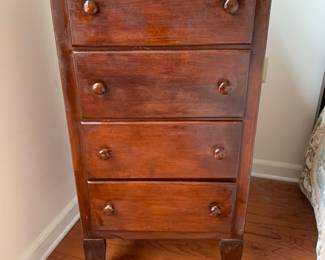wood 4- drawer chest with rollers