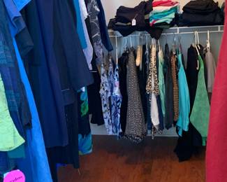 Ladies clothes and another closet with Men's 