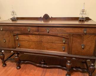 Stunning oak wood credenza with unusual pineapple pulls                                                                                                    
Marble base crystal electric lamps- sold
