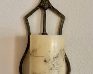 Candle and holder for that blank space on the wall.