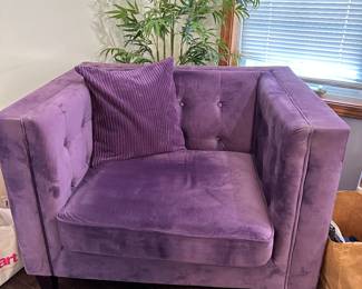 Purple velvet accent chair.