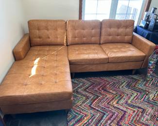 Caramel faux leather L-shaped sectional. 